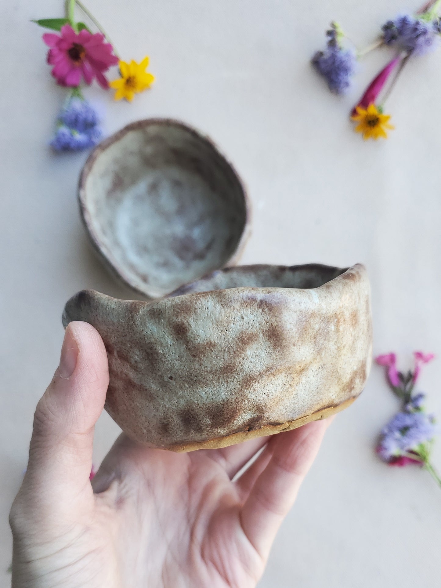 Pinch pot bowl set in Sandstone Shino